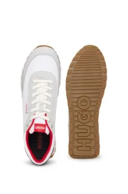 Mixed-material trainers with logo flag