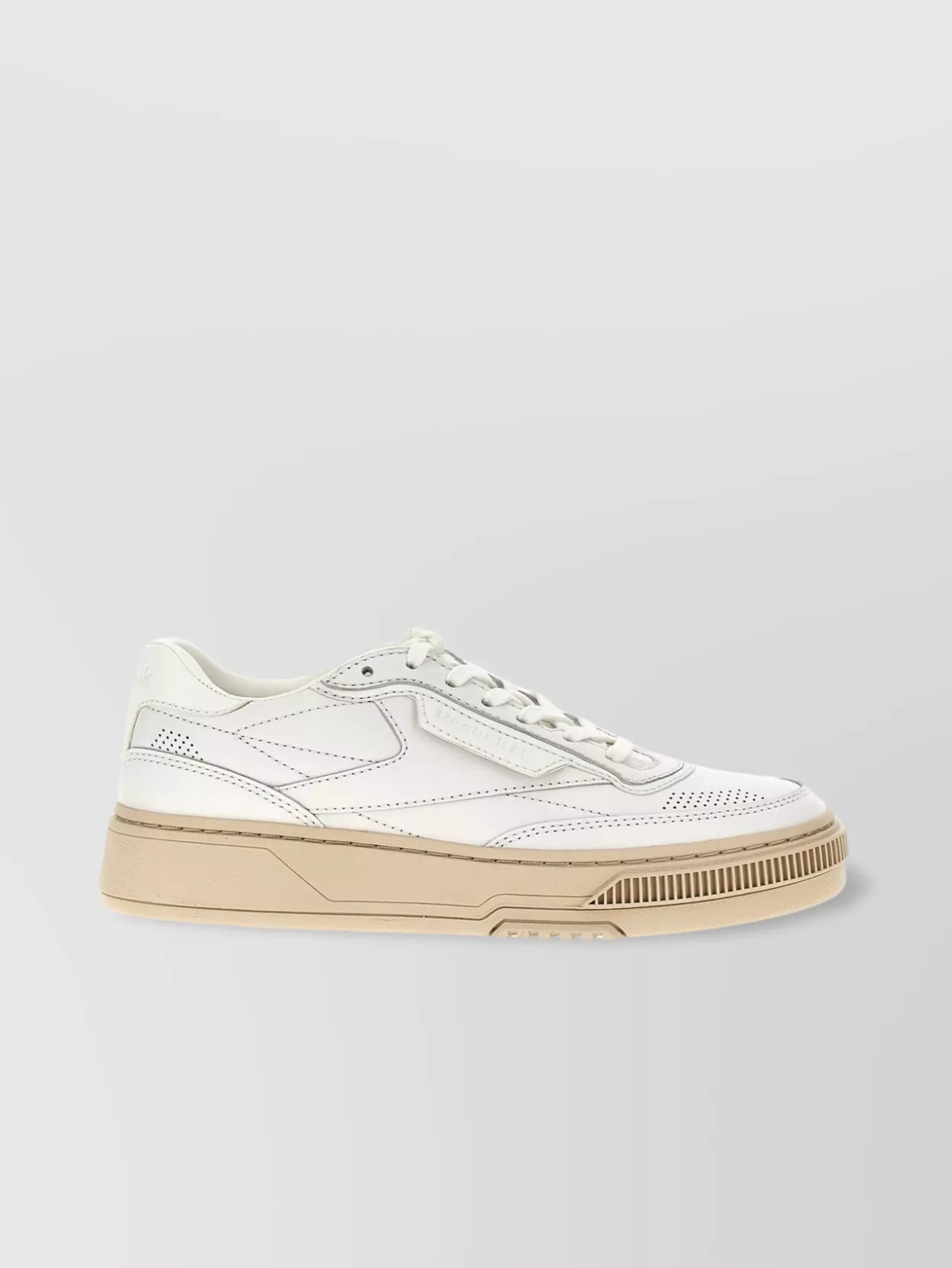 Reebok   Round toe low-top sneakers with perforated detailing