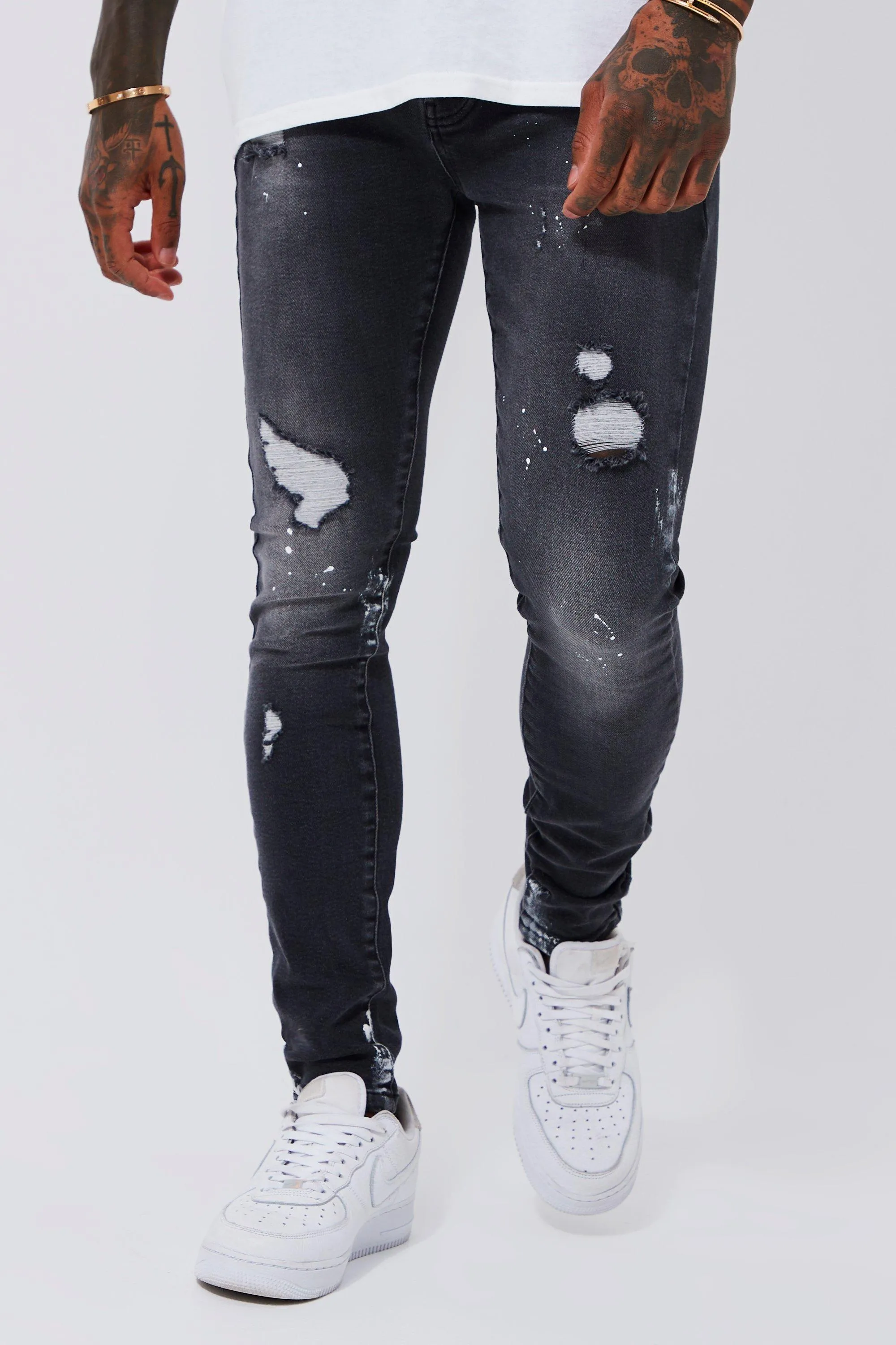 Super Skinny Ripped Paint Splatter Jeans